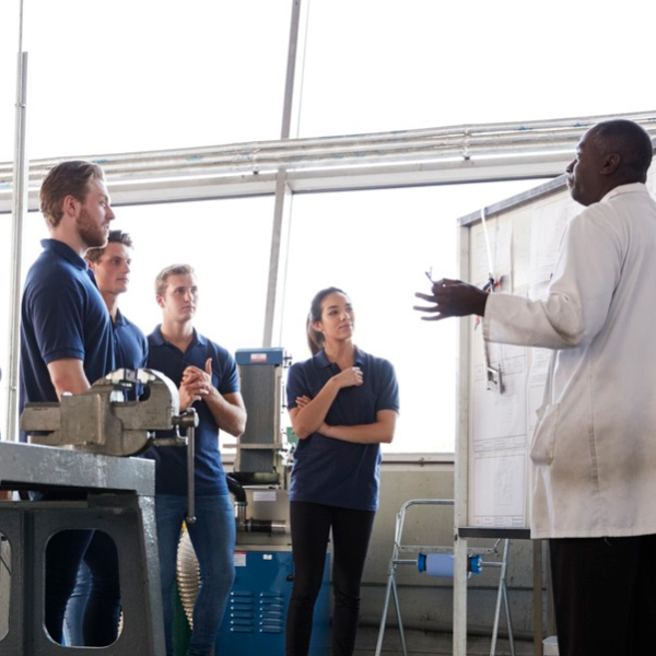 team listening to presentation